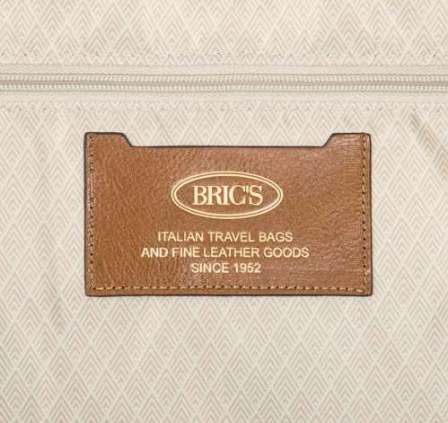 Bric's leather label on the quilted lining inside a Bellagio suitcase